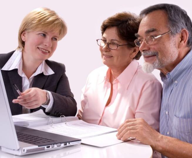 Business owners reviewing their listing
